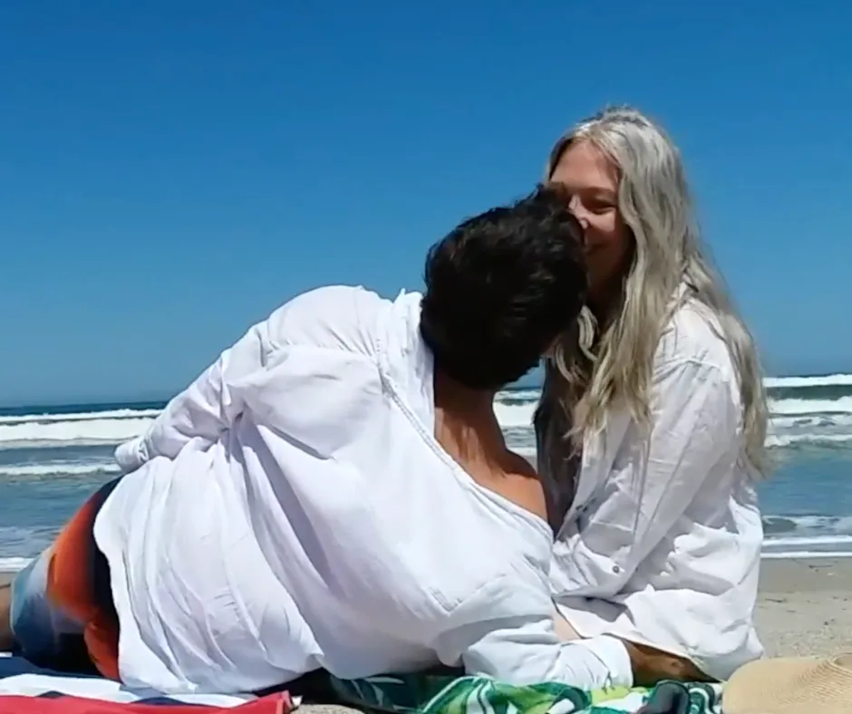 Couple kissing outdoors